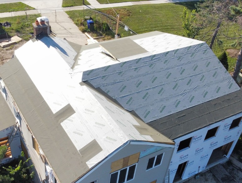 What Is The Difference Between Roof Installation And Replacement